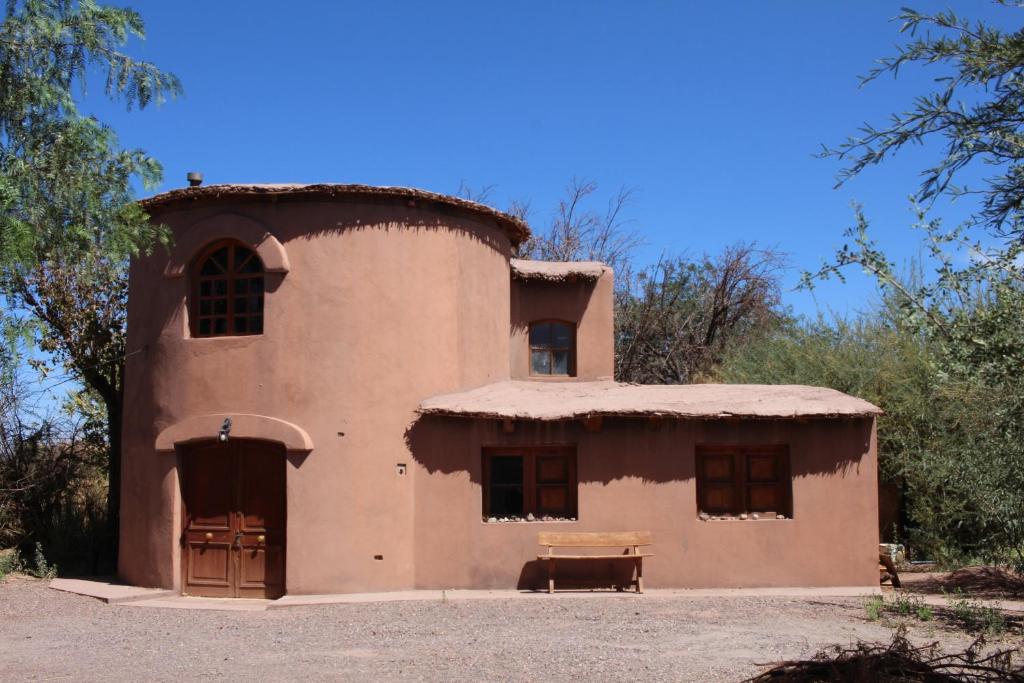 an old house in the middle of the desert at Casa Garces in San Pedro de Atacama