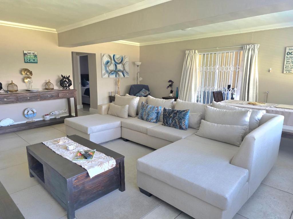 a living room with a couch and a table at Miskin Place Unit 2 in Kelso