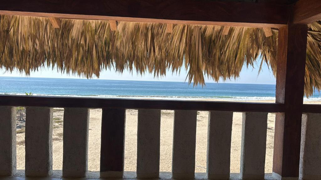 a view of the beach from a resort window at Casa paraíso escondido in Coyote