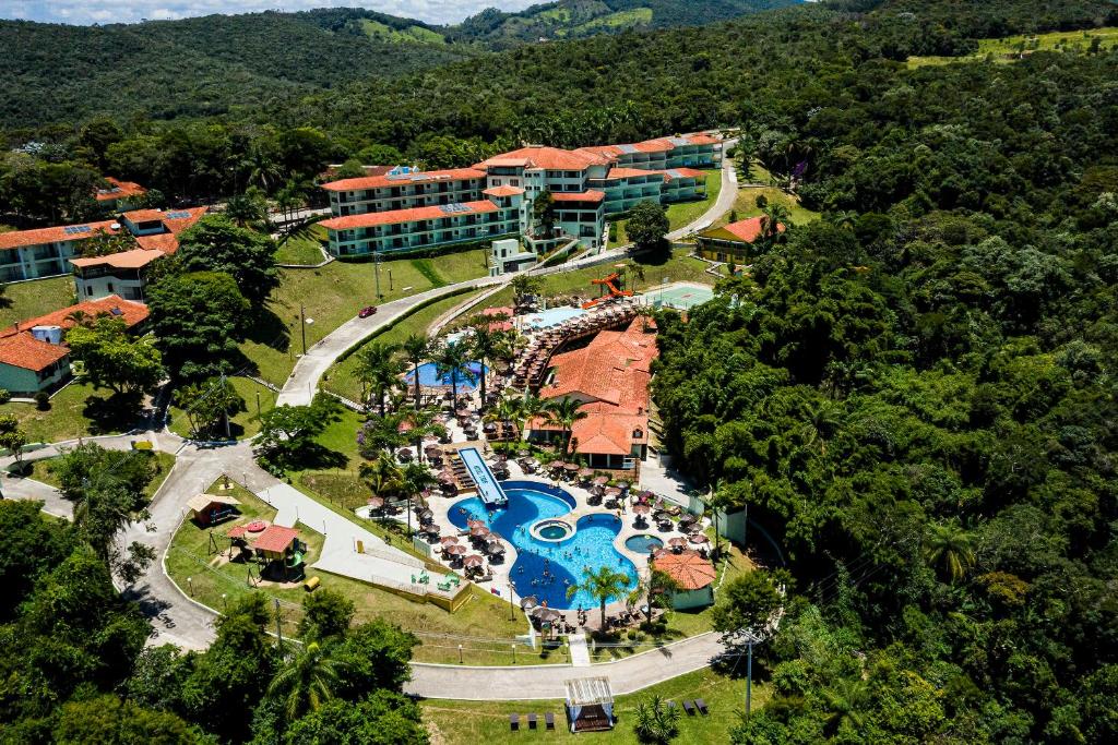 an aerial view of a resort with a swimming pool at Tauá Hotel & Convention Caeté in Roças Novas