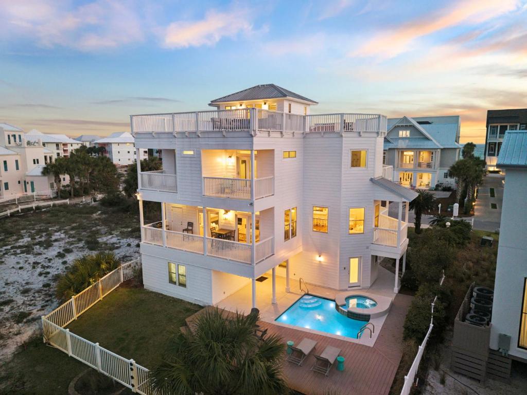 an aerial view of a house with a swimming pool at Dock N Dune by 30A Escapes in Seagrove Beach