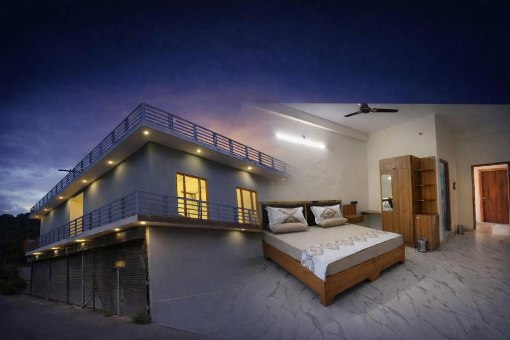 a bedroom with a bed in front of a house at Da Sampurn Hotel in Tiuni