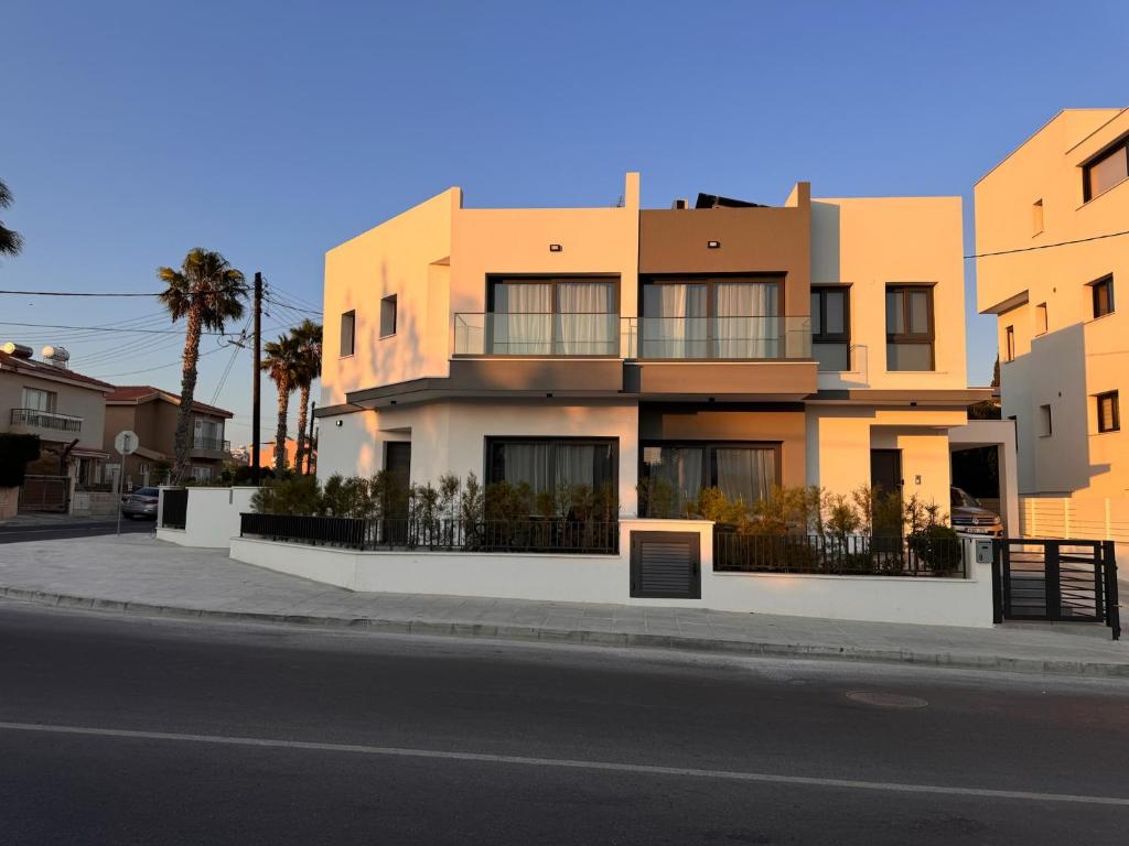 a building on the side of a street at Niko's Modern Family Home near the Beach in Limassol