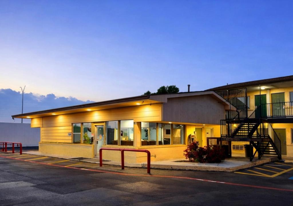 a building with a staircase in a parking lot at Budget Inn & Suites in Amarillo