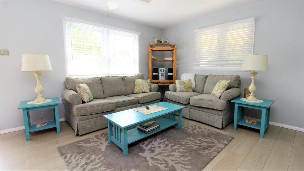 a living room with a couch and two tables at 12 Mechanic St in West Cape May