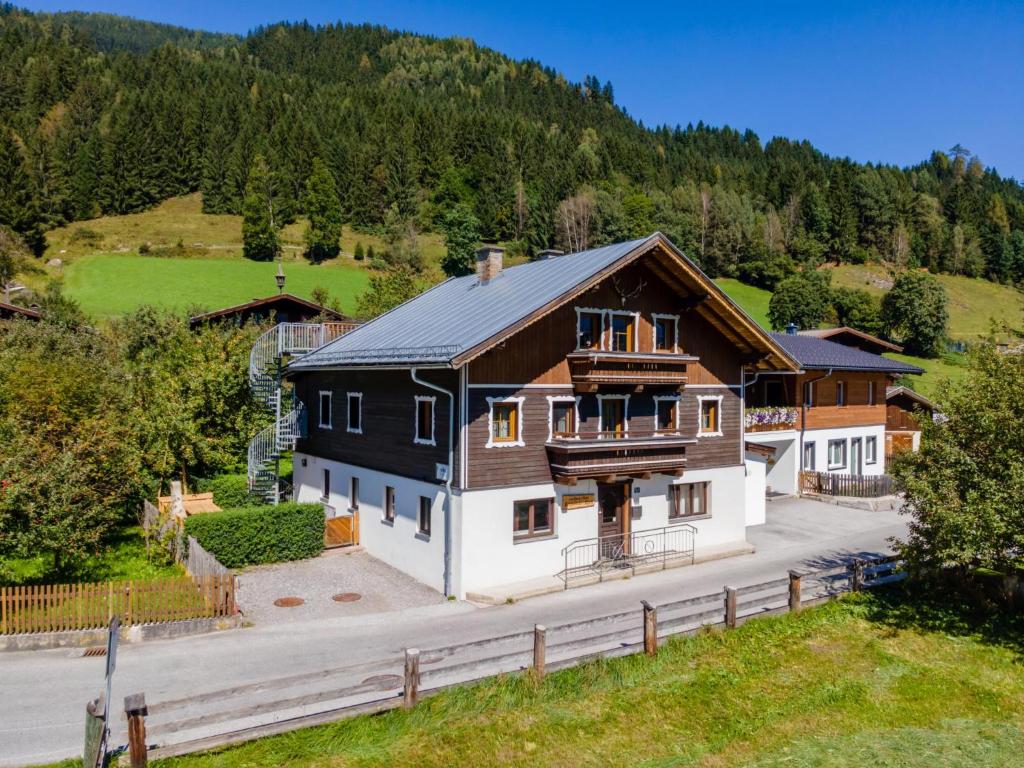 an aerial view of a house in the mountains at Kitzbüheler Alpen XL in Bramberg am Wildkogel