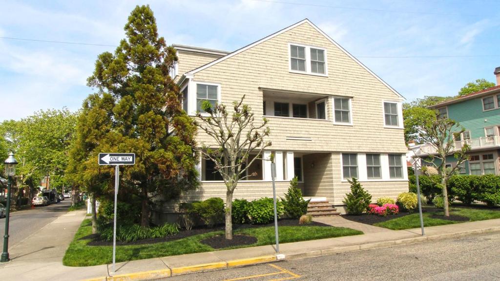 a house with a street sign in front of it at 209 Congress Street in Cape May