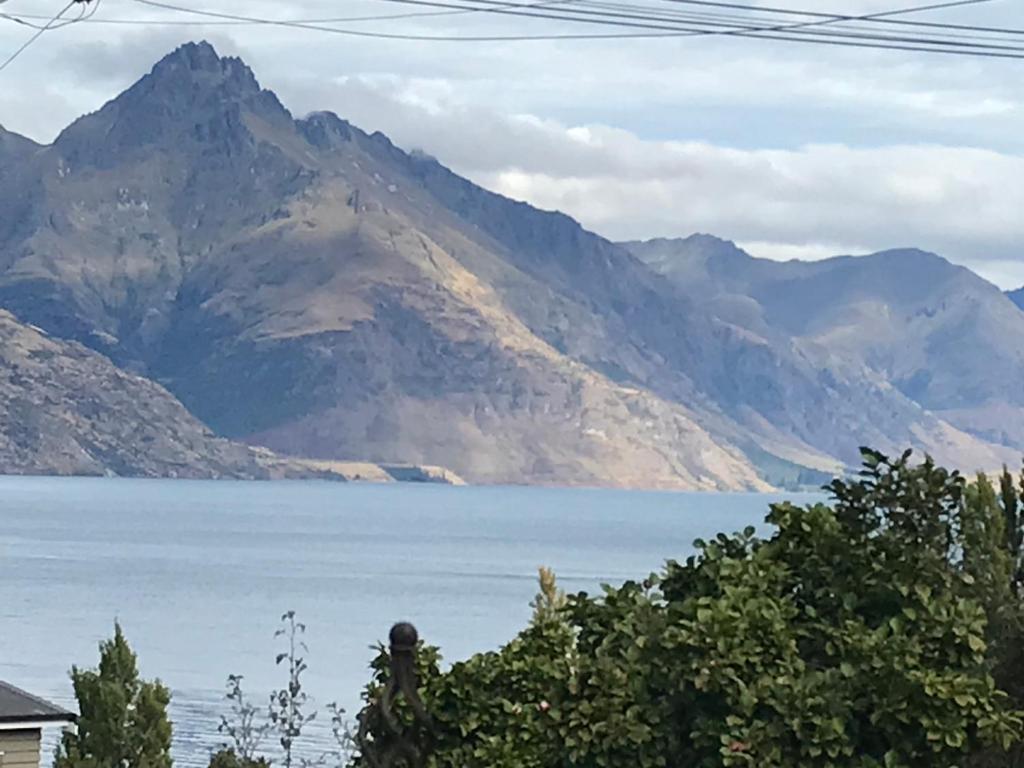 a view of a lake with mountains in the background at Lakeview QT in Queenstown