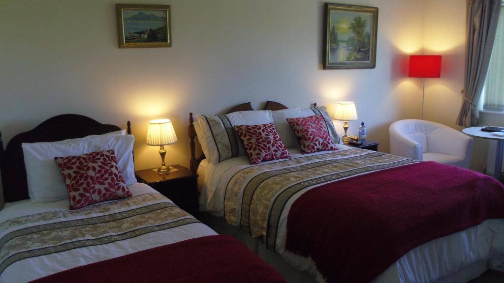 Postel nebo postele na pokoji v ubytování Cúl Draíochta B&B V23D540