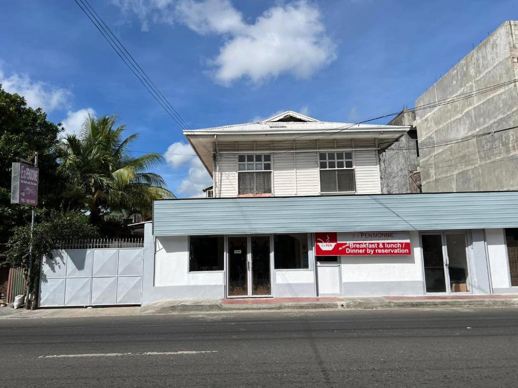 a building on the side of a street at En Pensionne, Lodging in Iloilo City