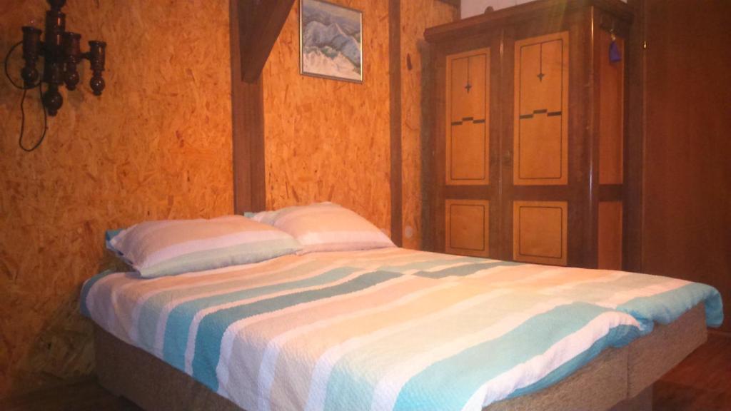 Posteľ alebo postele v izbe v ubytovaní Apartments T&M