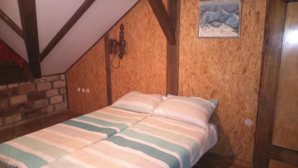 Posteľ alebo postele v izbe v ubytovaní Apartments T&M