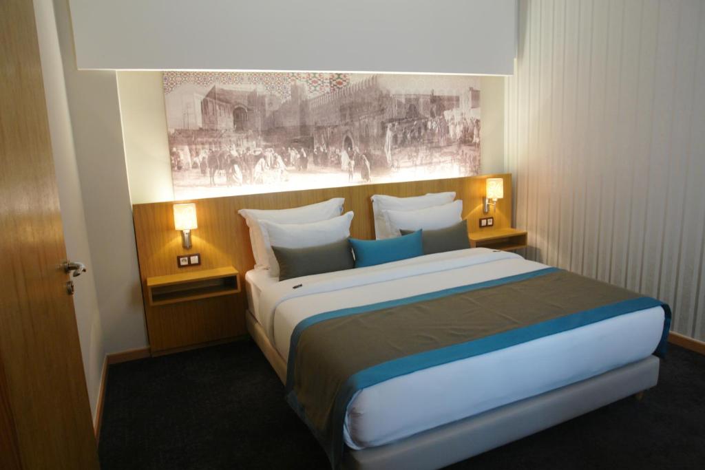 Postelja oz. postelje v sobi nastanitve ONOMO Hotel Rabat Terminus