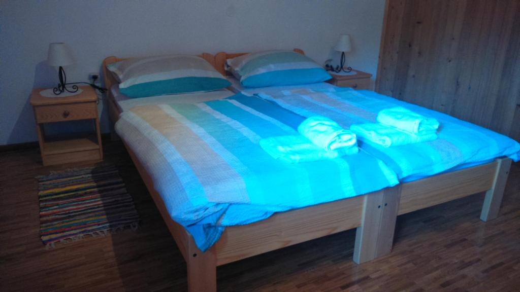Posteľ alebo postele v izbe v ubytovaní Apartments T&M