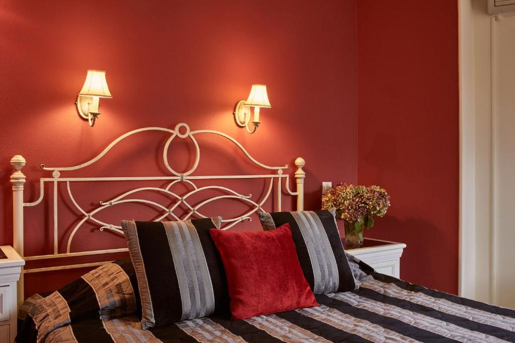 Postel nebo postele na pokoji v ubytování Hotel Dryades and Spa