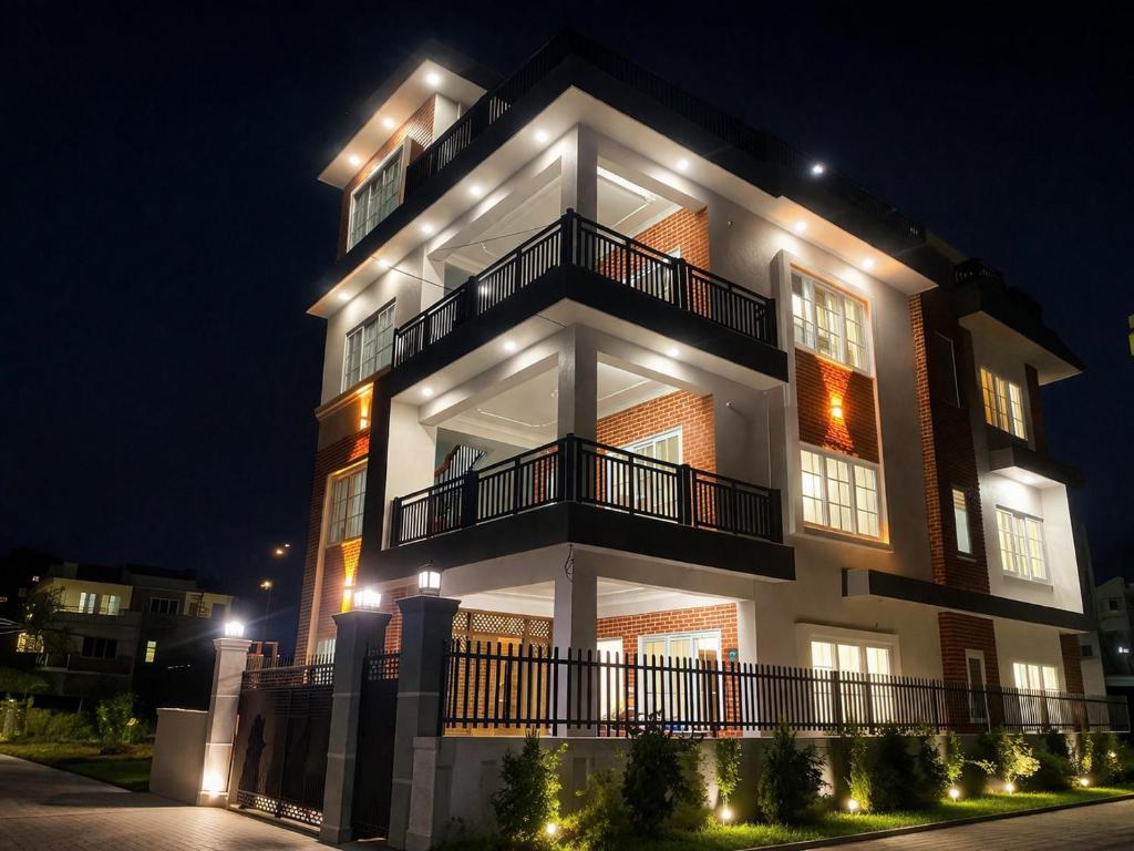 a large building with lights on it at night at Monastery View Homestay in Kathmandu