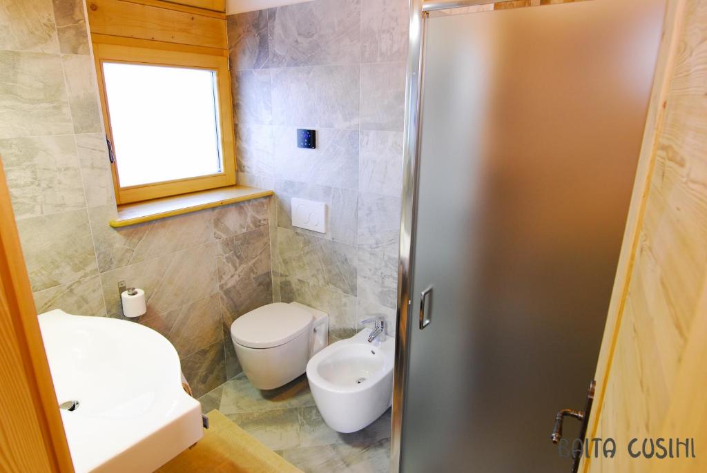 Koupelna v ubytování Residence Baita Cusini