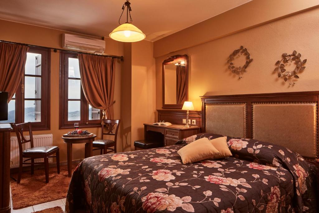 Postel nebo postele na pokoji v ubytování Hotel Dryades and Spa