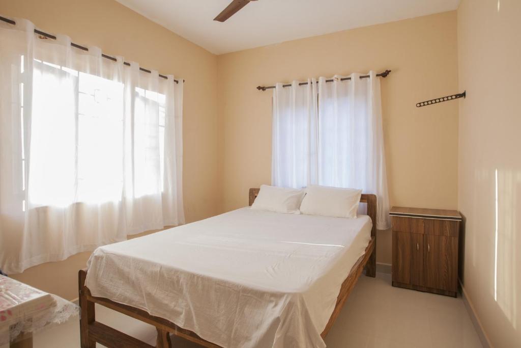 Postel nebo postele na pokoji v ubytování Fatima's Guesthouse