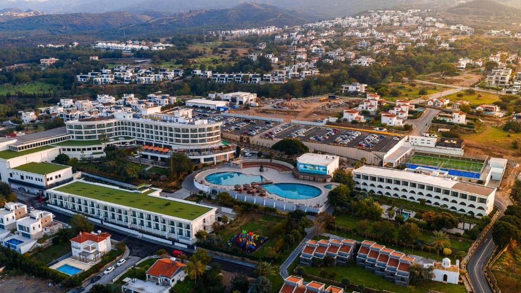 an aerial view of a city with buildings at Chamada Prestige Hotel and Casino in Kyrenia