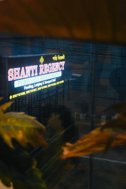 a sign for the front of a steak restaurant at Shanti Regency in Guwahati