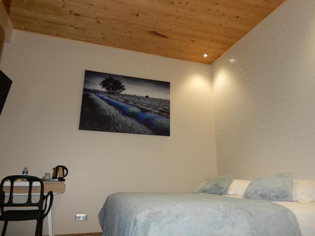 Postel nebo postele na pokoji v ubytování What Else Hotel