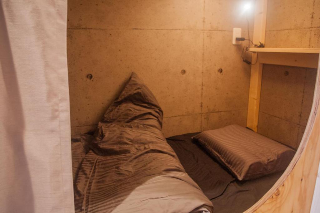 Postel nebo postele na pokoji v ubytování Picnic Hostel Osaka