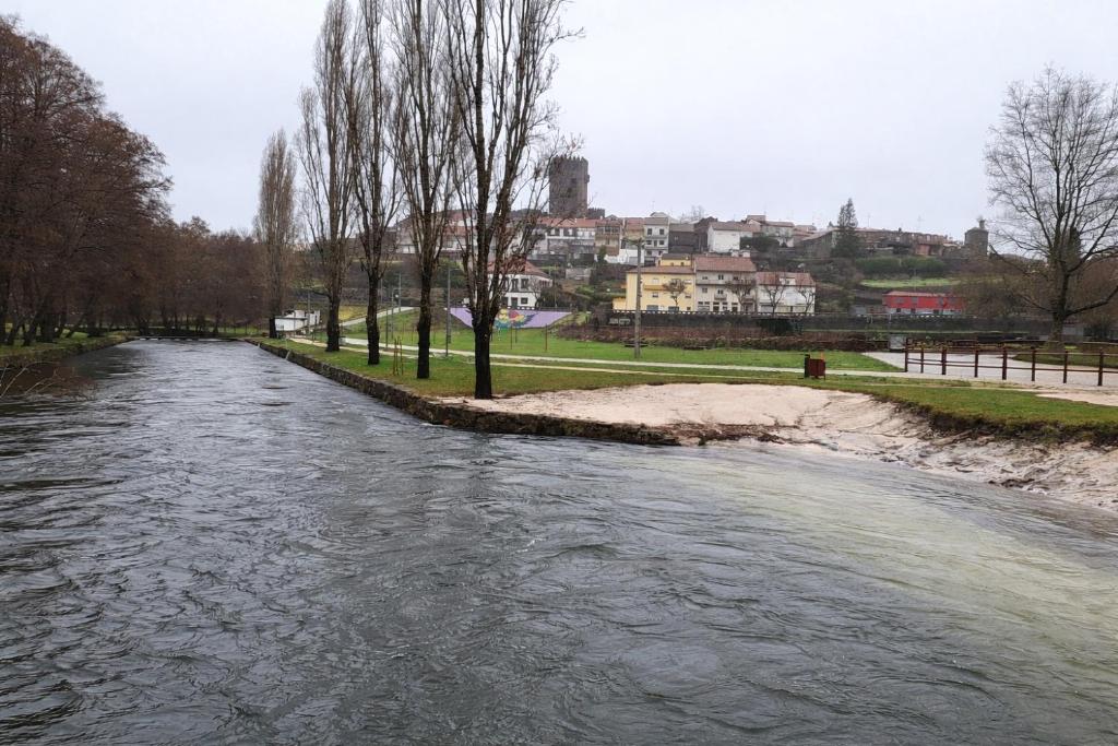 a view of a river with a city in the background at Casa Germano in Sabugal
