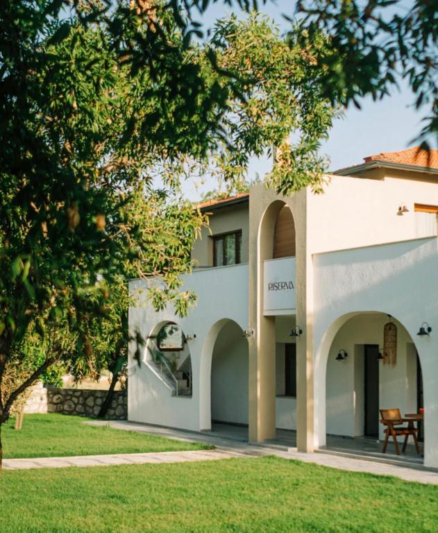 anterior view of a house with trees at Riserva Urla in Urla