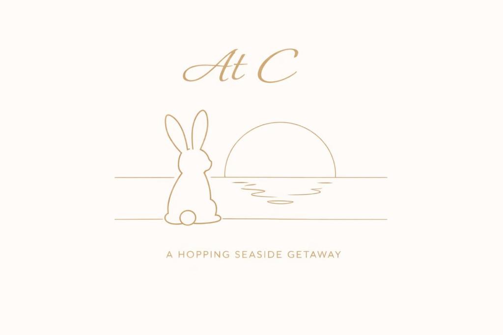 a cartoon illustration of a rabbit looking at a sunrise at Studio At C in Zandvoort