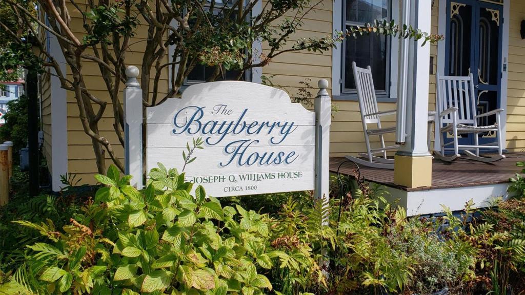 a sign for a bakery house in front of a house at The Bayberry House in Cape May