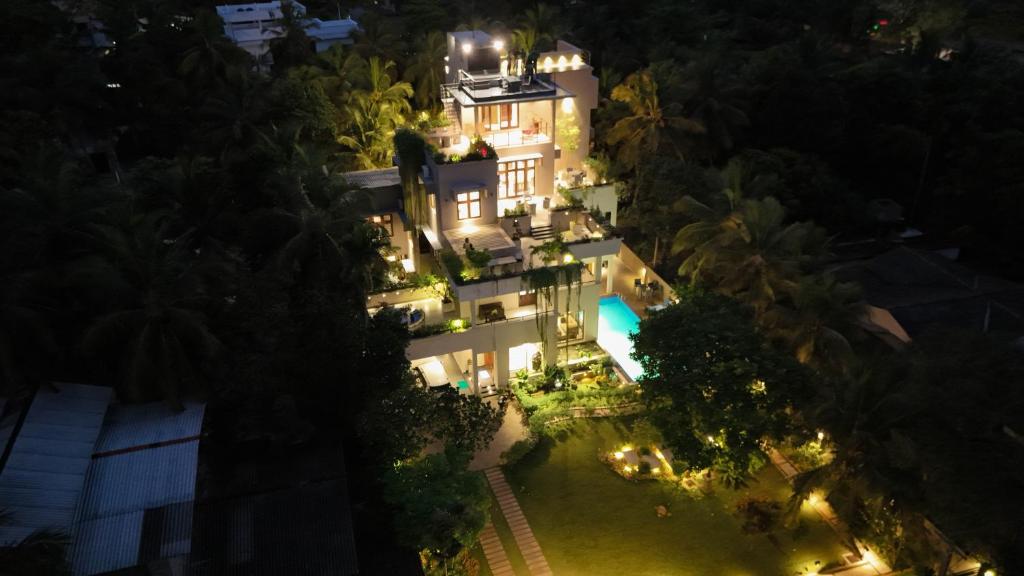 an aerial view of a mansion at night at Dhanora Dynasty Resort in Anuradhapura
