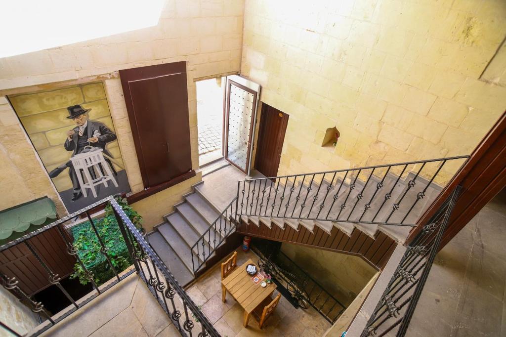 an overhead view of a staircase in a building at Levissi boutique hotel in Gaziantep