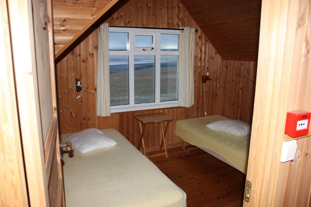 Postel nebo postele na pokoji v ubytování Ósar Hostel