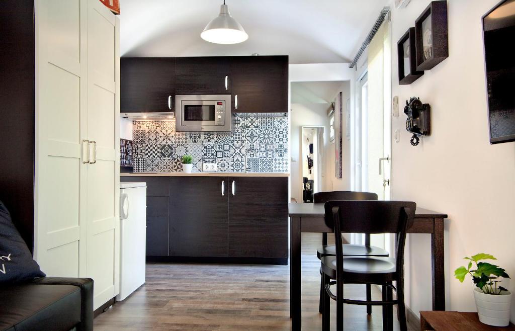 A kitchen or kitchenette at Alojamiento Vagón Rural