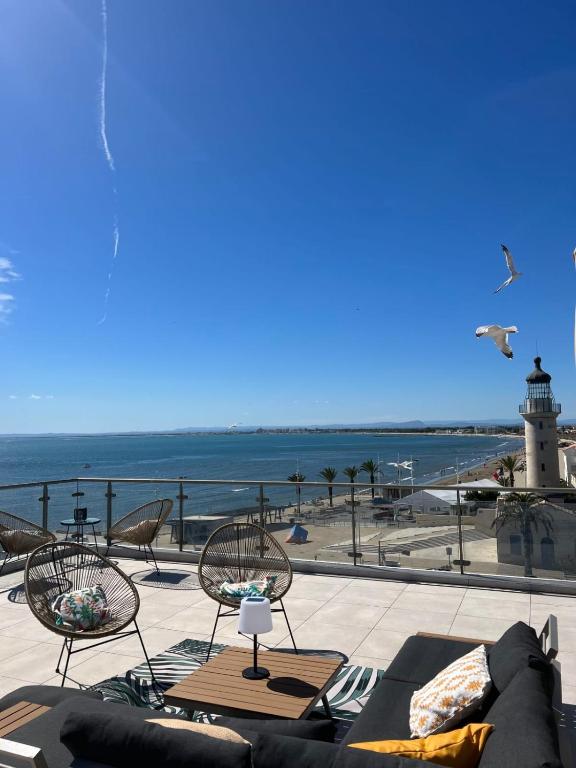 Le Phare du Grau Duplex dexception rooftop 100 m vue mer panoramique