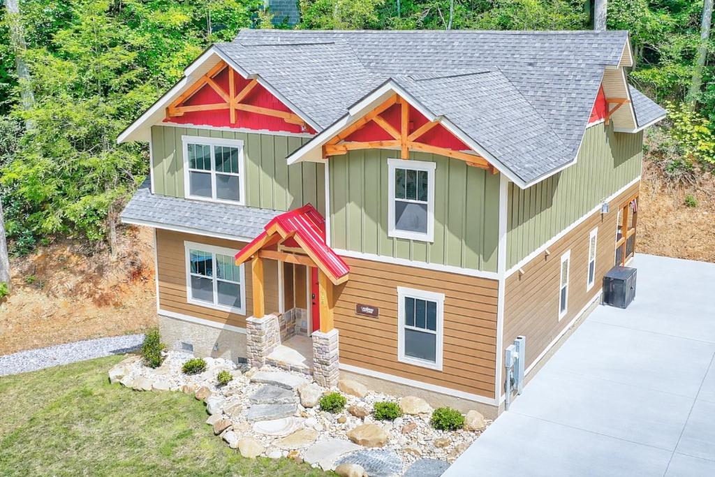 a model of a house with a garage at Bears Haven – Elegant 3 BR Chalet Game Area, Hot Tub, see through fire place in Gatlinburg