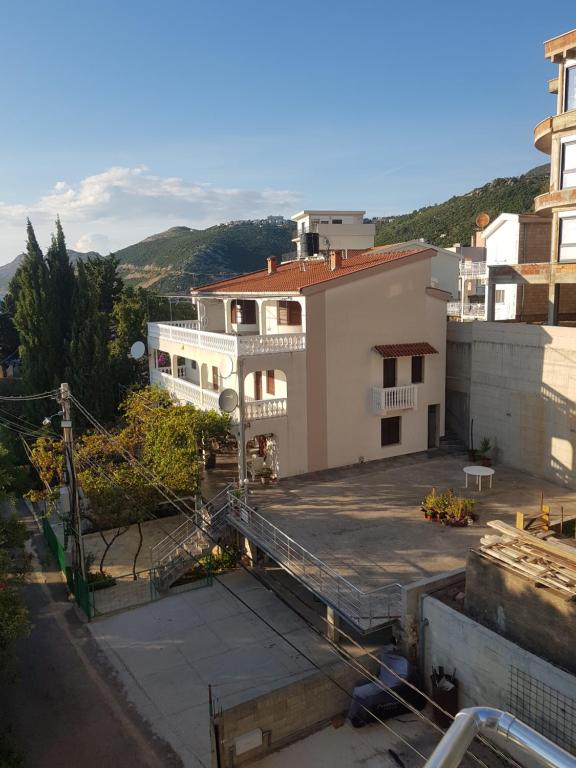 an aerial view of a building with a balcony at Vila Familija in Dobra Voda