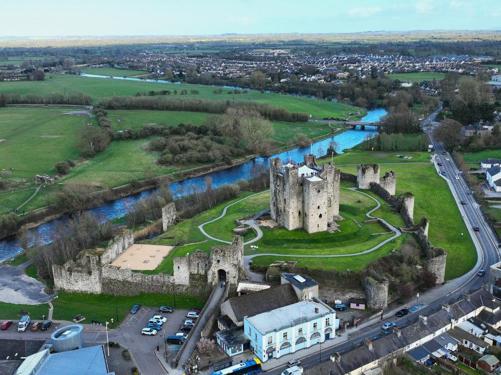 an aerial view of a castle and a river at Trim private rooms in Trim