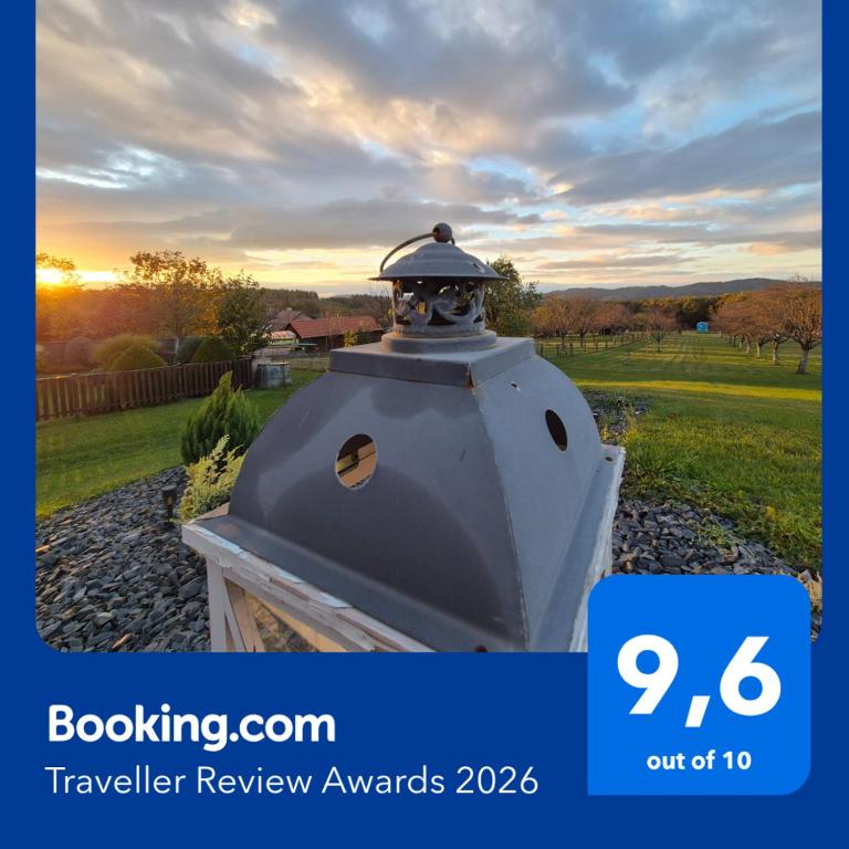 a sign that says travel review awards with a picture of a house at CHALUPA KOTÁR - KLIMA a 7 míst za 1 cenu in Haluzice