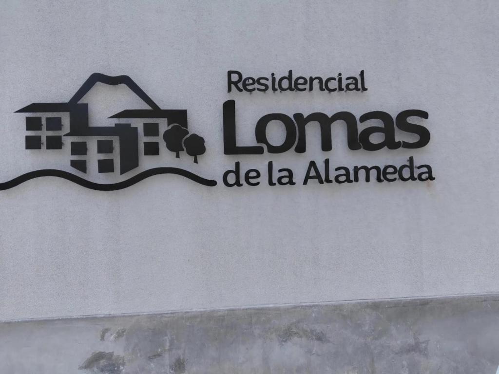 a sign that reads residentialolis de la alhambra at Cusi Wasi AQP in Arequipa