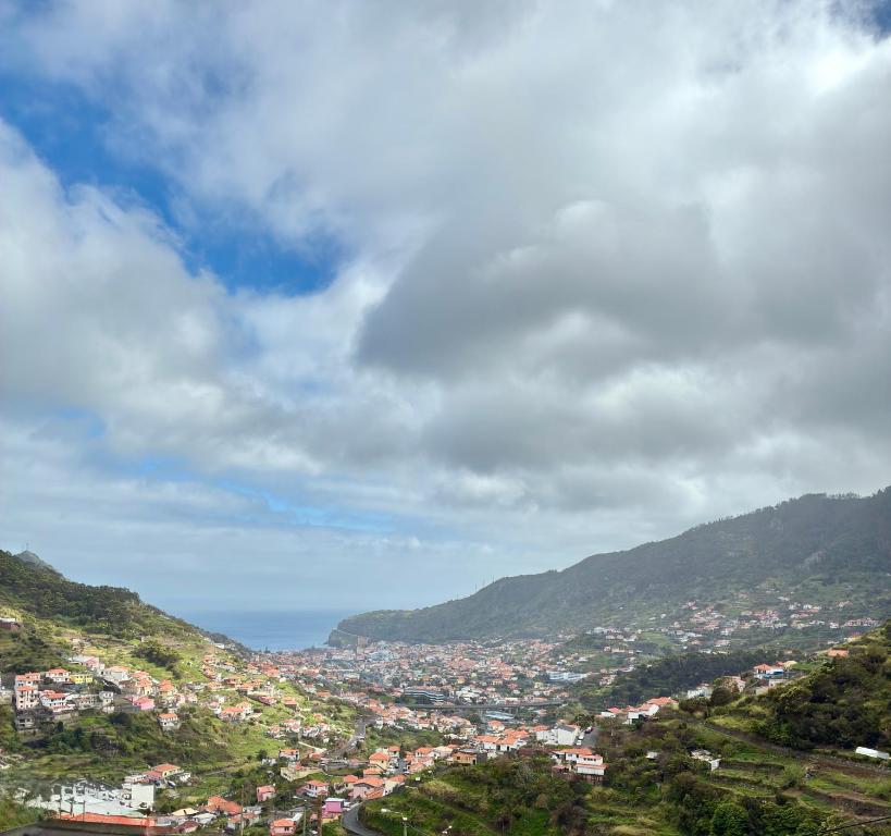 a view of a city from a mountain at Seaside & Levada Escape in Machico