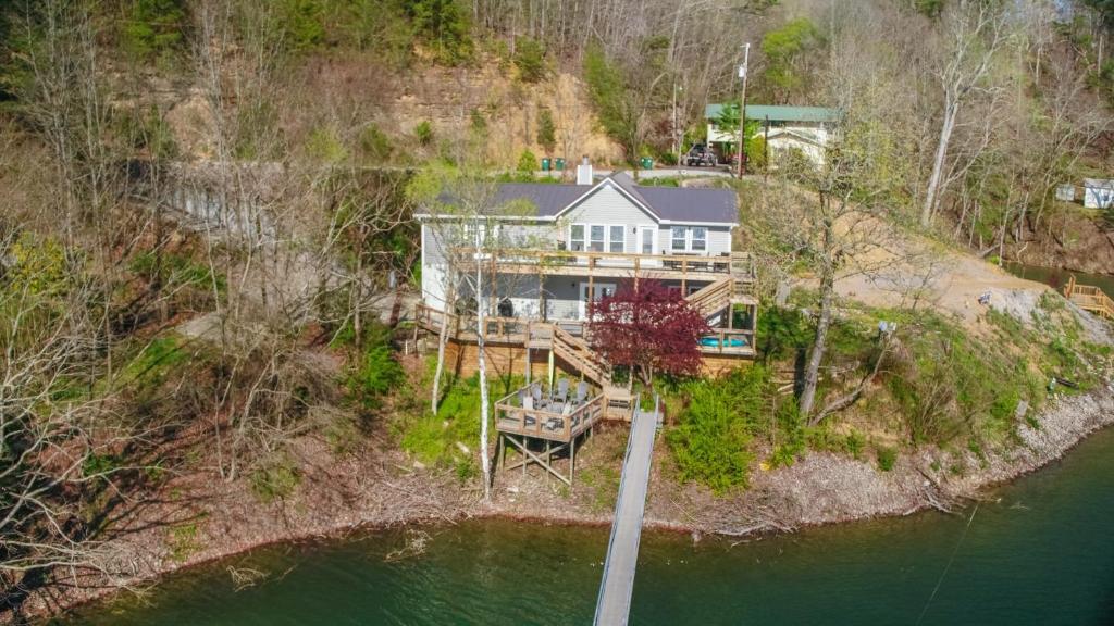 an aerial view of a house on the water at Sunset Cove - Large Cove, Gorgeous Sunsets, Amenities Galore! in Bremen