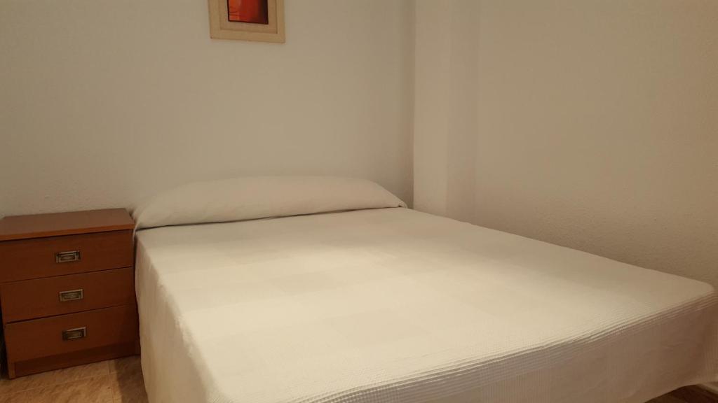 Postel nebo postele na pokoji v ubytování Camping Los Pinos