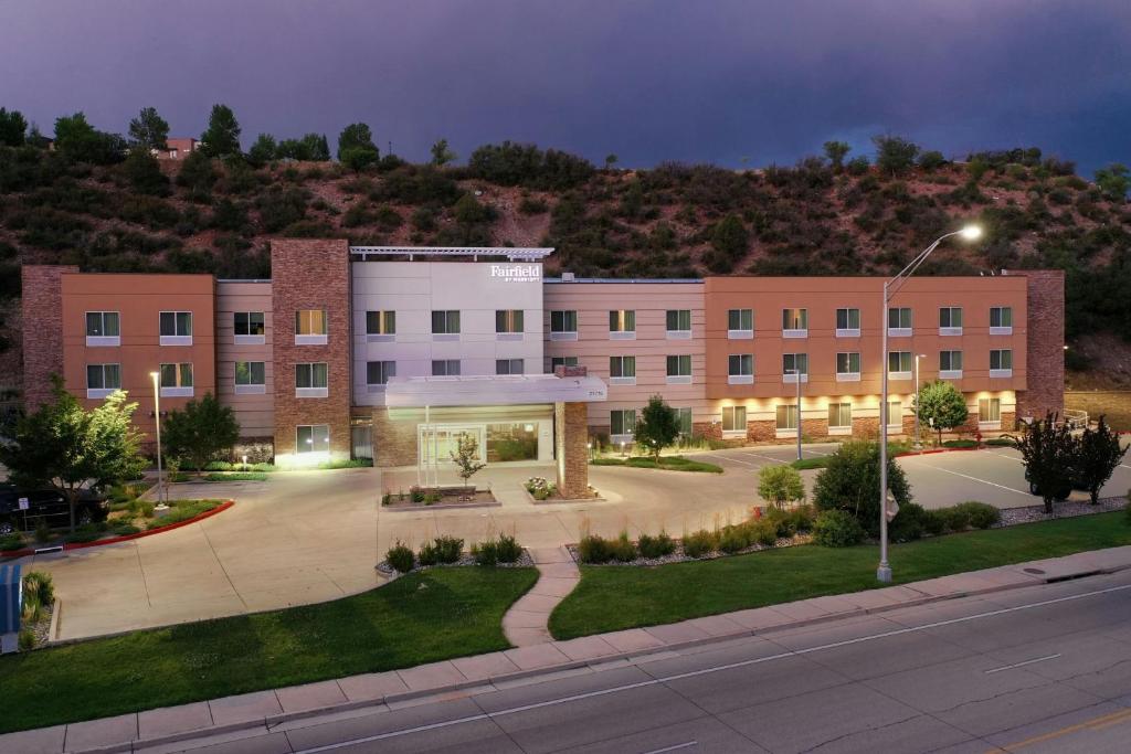 an apartment building with a parking lot in front of it at Fairfield Inn & Suites by Marriott Durango in Durango