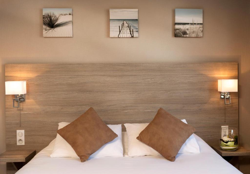Postel nebo postele na pokoji v ubytování Hotel Regina & Spa