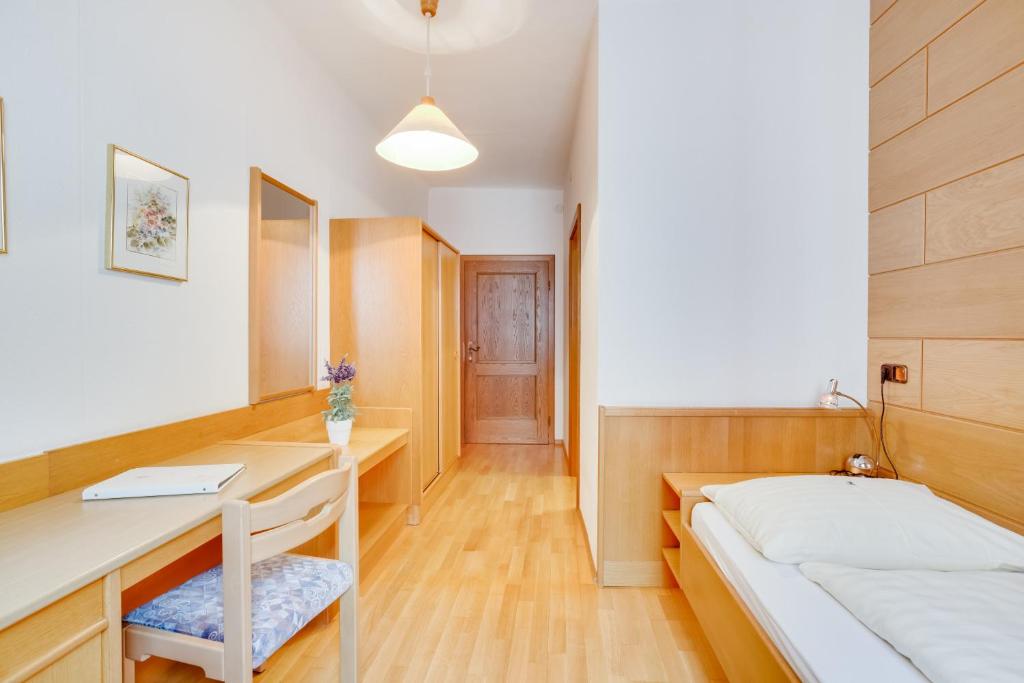Postel nebo postele na pokoji v ubytování Hotel Himmelreich
