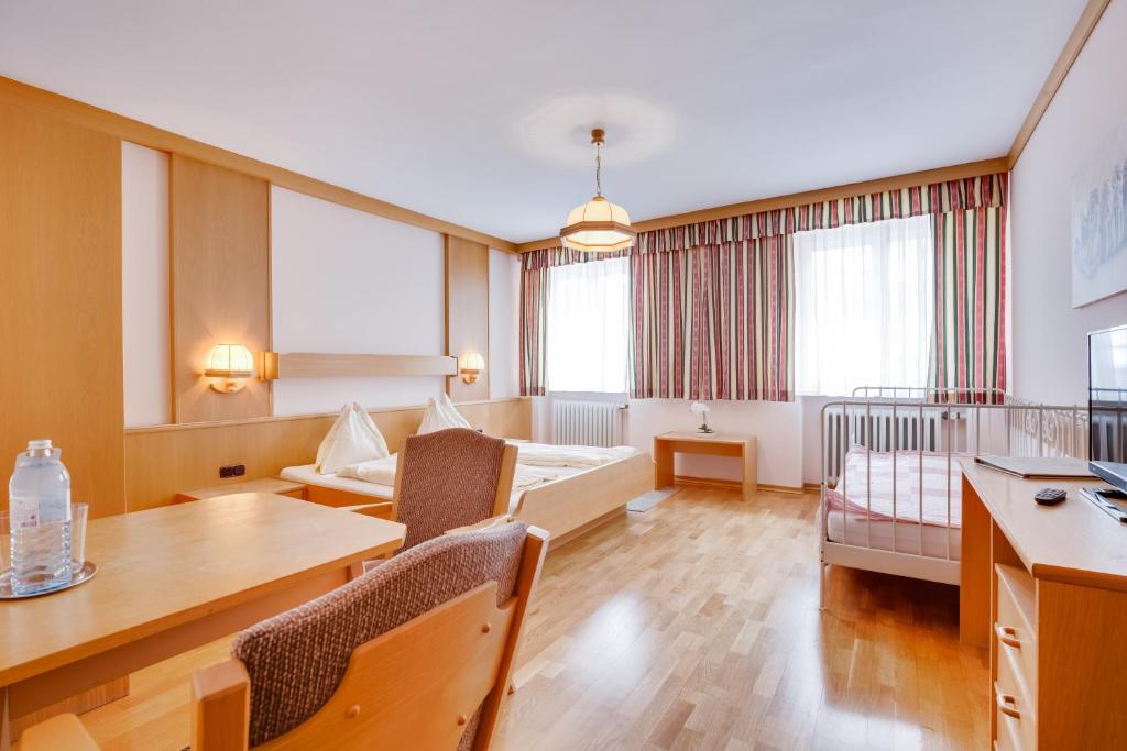 Postel nebo postele na pokoji v ubytování Hotel Himmelreich