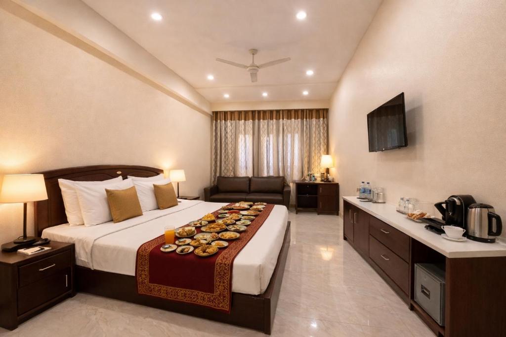 تصویر اتاق‌های Hotel Kasa Stays Near Pacific Mall NSP Pitampura - تصویر ۲