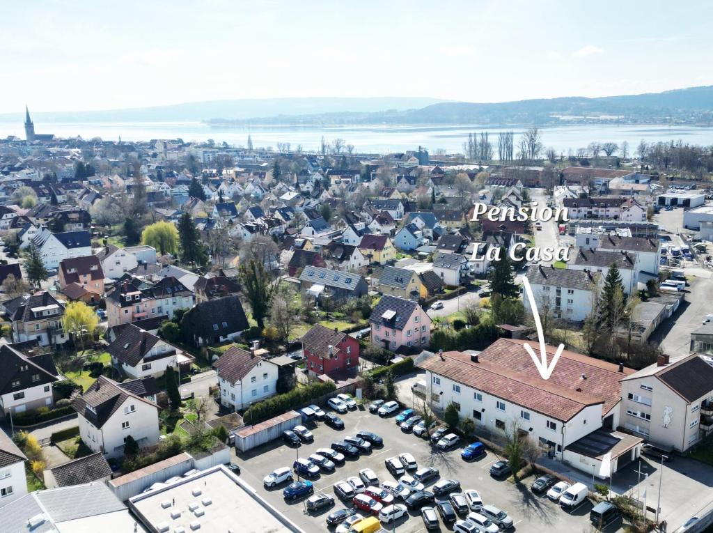 an aerial view of a town with a city at Pension La Casa in Radolfzell am Bodensee